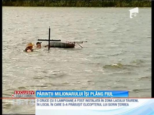 Cruce ridicata in lacul in care elicopterul lui Sorin Terbea s-a prabusit