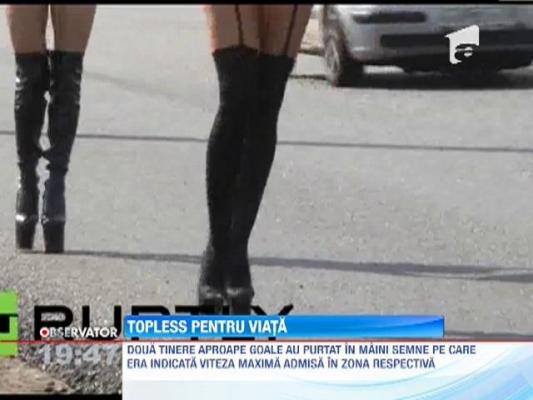 Doua tinere din Rusia isi folosesc farmecul personal ca sa ii convinga altfel pe soferi sa respecte viteza regulamentara