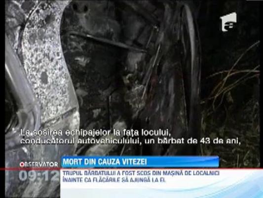 O masina a luat foc pe o sosea din Gorj dupa ce s-a izbit de un cap de pod