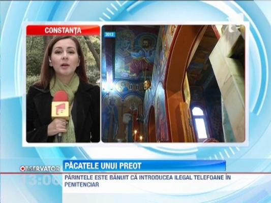 Un preot din Bacau, banuit ca introducea ilegal telefoane in penitenciar