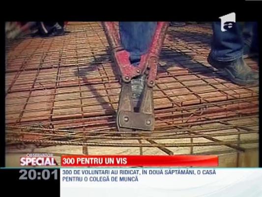 SPECIAL! 300 de voluntari au ridicat, in doua saptamani, o casa pentru o colega de munca