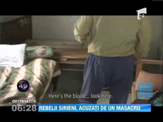 Rebelii islamisti din Siria au ucisi zeci de civili din secta musulmana din care apartine Bashar al-Assad