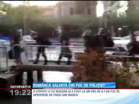 Româncă salvată de foc de un polițist