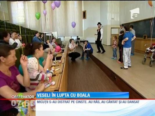 Lecţie de viaţă! Nici boala nu le poate şterge zâmbetul de pe buze copiilor