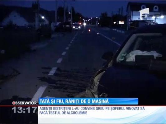 Tată şi fiu, răniţi de o maşină