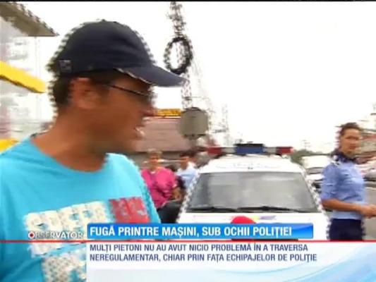 Fuga printre maşini, sub ochii poliţiei