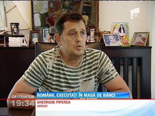 Românii, executați în masă de bănci