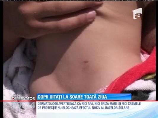 Copii uitaţi la soare toată ziua