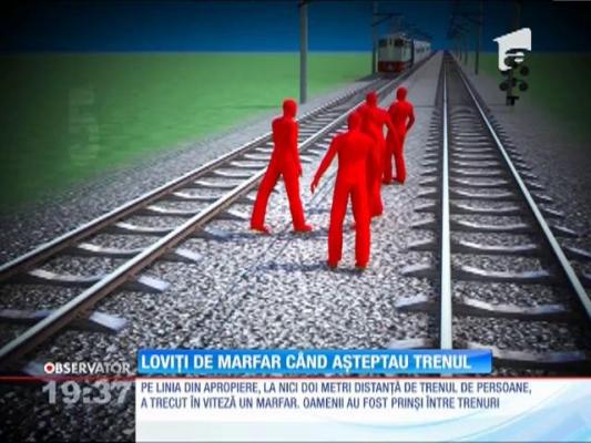 Șapte oameni, loviți de marfar când așteptau trenul