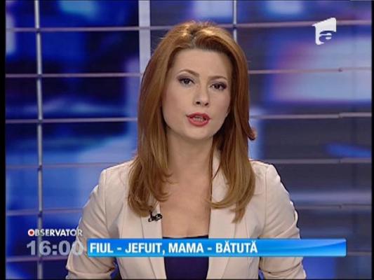 Fiu jefuit şi mamă bătută de hoţ