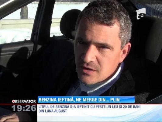 Benzina, tot mai ieftină