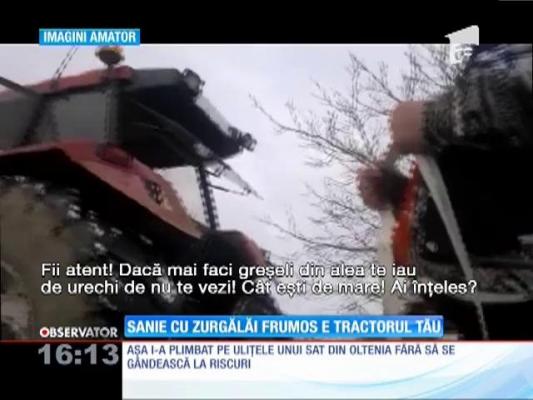 Distracţie periculoasă: Sănii pline cu copii trase de un tractor