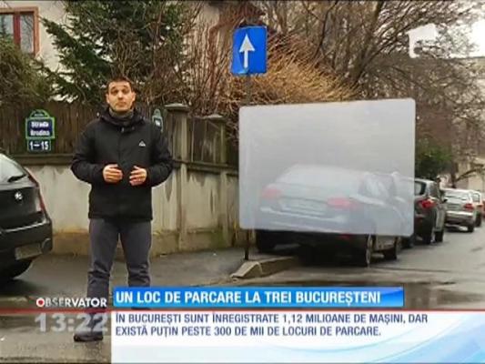 Un loc de parcare la trei bucureşteni