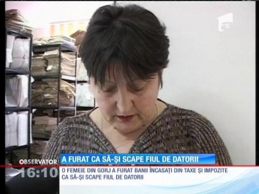 O mamă a furat ca să-şi scape fiul de datorii