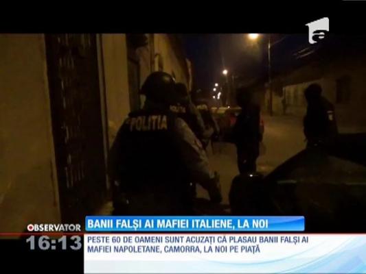 Români suspectaţi că au plasat bani falşi, ai mafiei napoletane, la noi în țară