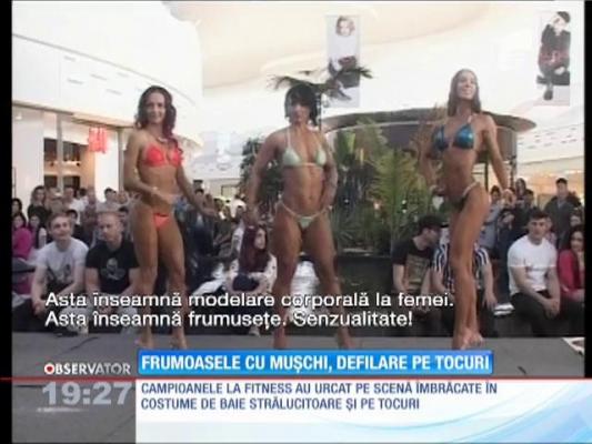 Frumoasele cu mușchi, defilare pe tocuri