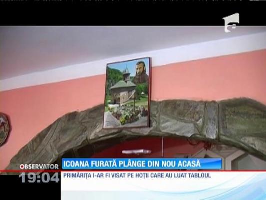 Icoana furată cu Arsenie Boca, găsită lângă un gard