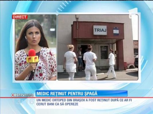 Medic reținut pentru șpagă. Doctorul ar fi cerut 900 de lei pentru o operaţie