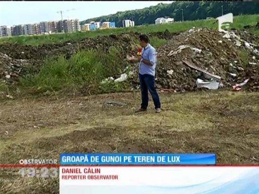 Groapă de gunoi pe un teren de lux din nord a Capitalei