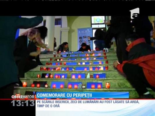 Părul unei femeie a luat foc la o comemorare a copiilor care au părasit această lume