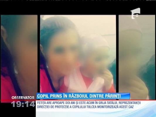 Copil prins în războiul dintre părinți