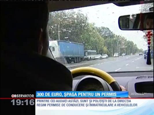 Update! Zeci de instructori auto ridicaţi cu mandate şi duşi la audieri