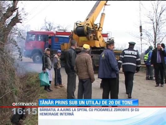 Tânăr prins sub un utilaj de 20 de tone