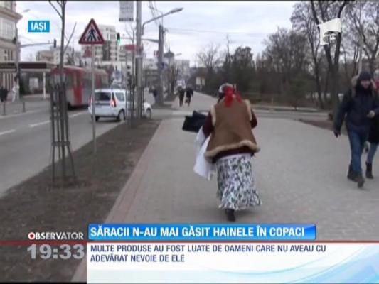 Rromii, atac la hainele destinate oamenilor săraci