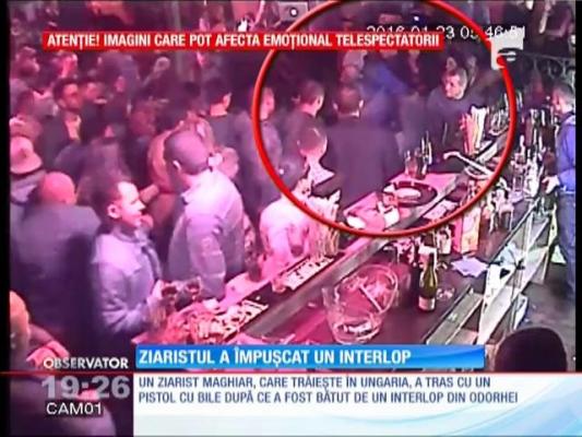 Interlop împușcat de un ziarist