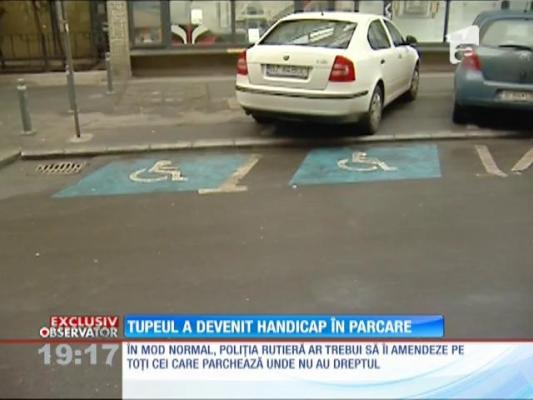 Locurile de parcare pentru persoanele cu handicap, invizibile pentru şoferii