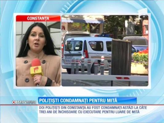 Polițiști condamnați la 3 ani de închisoare pentru luare de mită