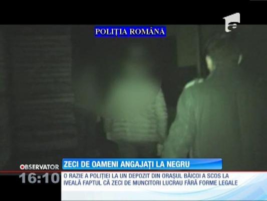 Zeci de oameni angajați la negru într-un depozit de ambalare a fructelor şi legumelor
