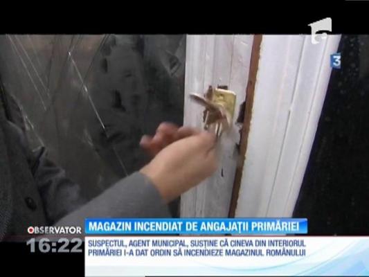 Magazin incendiat de angajații primăriei