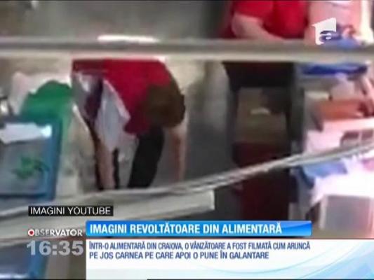 Vânzătoarea unei alimentare din Craiova, surprinsă în timp ce aşeza în galantare o bucată de carne ce fusese aruncată pe jos!