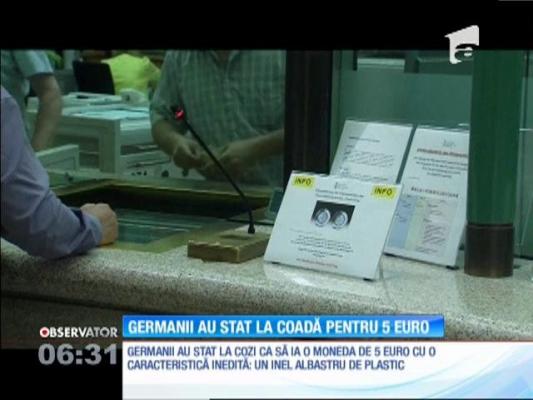 Germanii au stat la coadă în faţa băncilor pentru 5 euro