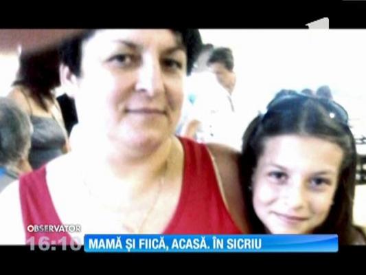 Mamă și fiică, acasă. În sicriu