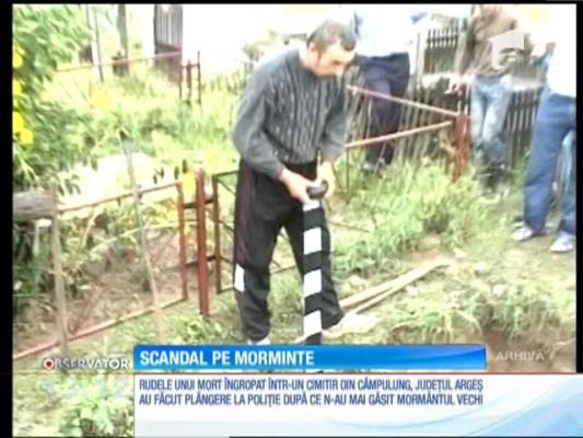 Scandal mare într-un cimitir din Câmpulung! Oamenii se ceartă pe un mormânt