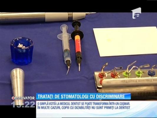 Copiii cu dizabilităţi, tratați de stomatologi cu discriminare
