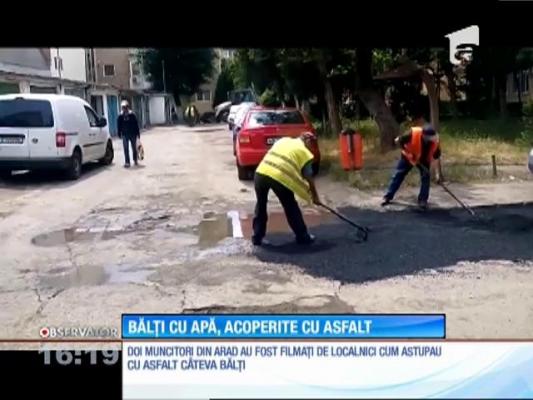 Bălți cu apă, acoperite cu asfalt!