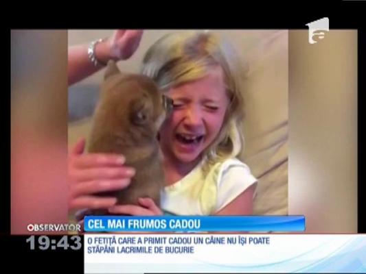 Reacţia unei fetiţe care primeşte în dar un căţeluş a stârnit valuri pe internet