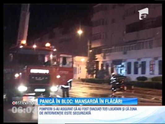Noapte de groază pentru locatarii unui bloc din Târgu Jiu! Un incendiu violent a mistuit mansarda clădirii
