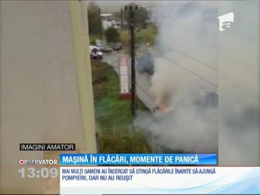 O maşină parcată a luat foc pe o stradă din Dej