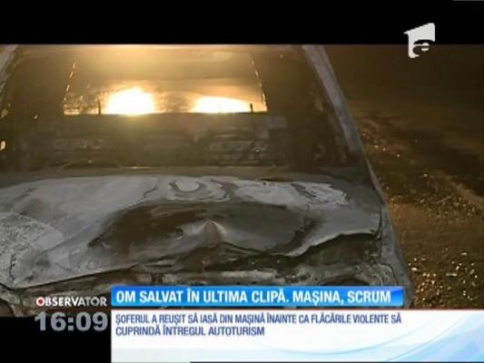 Salvat în ultima clipă din mașina cuprinsă de flăcări