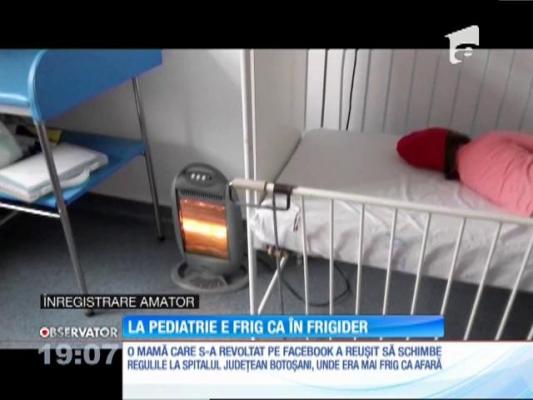 În secţia de pediatrie a Spitalului Judeţean Botaşani, frig ca afară. O fetiţă se încălzea cu sticle cu apă fierbinte!