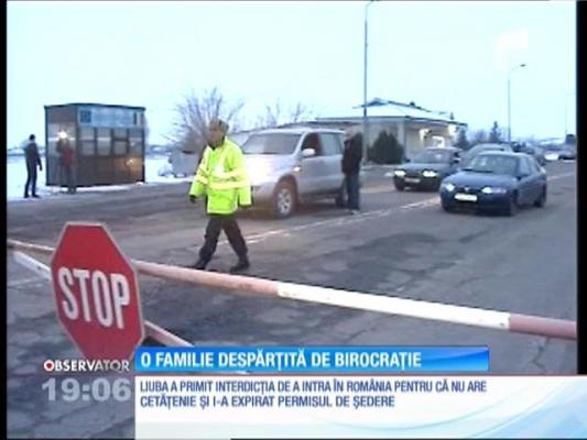 O familie cu patru copii este despărţită, în două state, de birocraţie