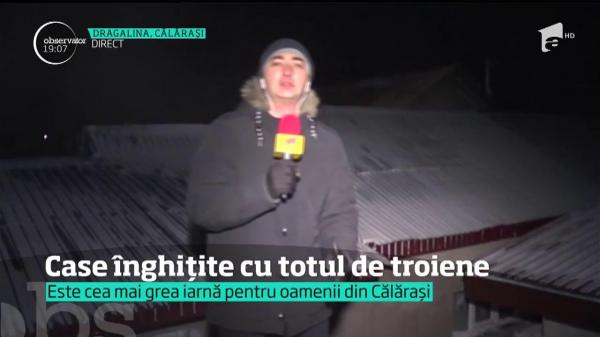 Case înghițite cu totul de troiene, la Dragalina!