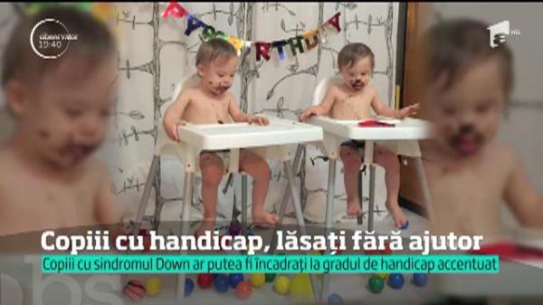 Copiii cu dizabilităţi riscă să rămână fără însoţitor şi doar cu un sfert din indemnizaţie