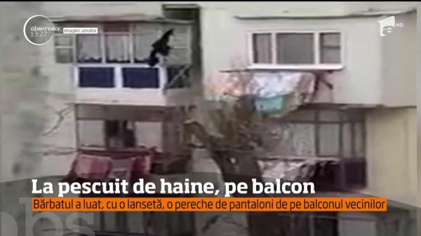 La pescuit de haine, pe geam! Un bărbat A FURAT, cu O UNDIȚĂ, o pereche de pantaloni din balconul vecinilor (VIDEO)