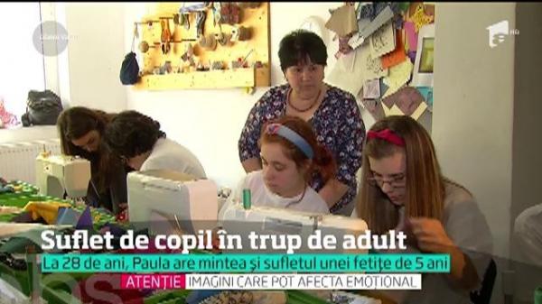 Suflet de copil în trup de adult. O mamă cu un copil bolnav fără şanse de vindecare a avut o iniţiativă unică în România