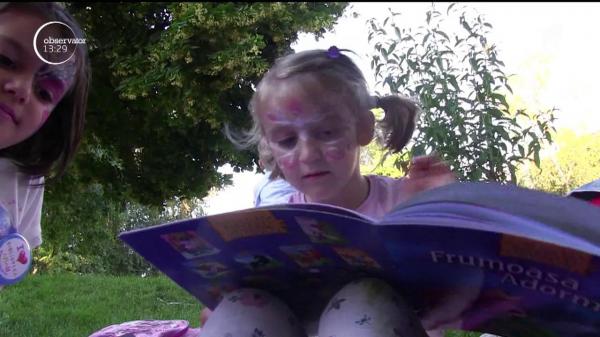 O carte, o pătură şi sute de pasionaţi de lectură în aer liber!